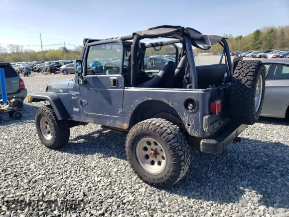 2002 Jeep Wrangler Sport with VIN 1J4FA49S92P715480, listed as a Copart auction lot 55157545 with 153,560 mi miles and Clean Title. Bid and sale history available at carsss.com. Image 2.