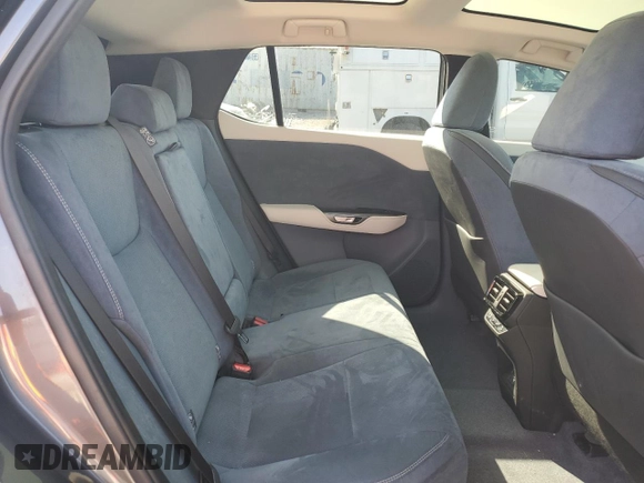 2023 Lexus RZ 450e Premium z VIN JTJAAAAB5PA007146, wystawiony jako Copart lot #50764805 z przebiegiem 20 747 mil mil oraz Szkoda całkowita • Salvage title. Historia ofert i sprzedaży dostępna na DreamBid. Obrazek 11.