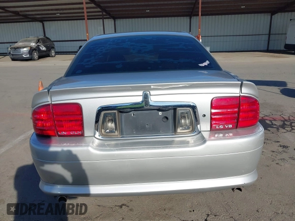 2002 Lincoln LS w/Base Pkg with VIN 1LNHM87A62Y691524, listed as a IAAI auction lot 41670369 with 166,567 mi miles. Bid and sale history available at carsss.com. Image 17.