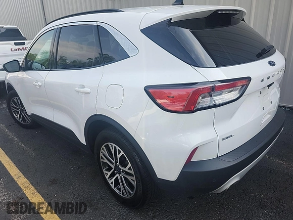 2020 Ford Escape SEL z VIN 1FMCU9H69LUB11749, wystawiony jako IAAI lot #42392315 z przebiegiem 64 802 mil mil oraz . Historia ofert i sprzedaży dostępna na DreamBid. Obrazek 1.