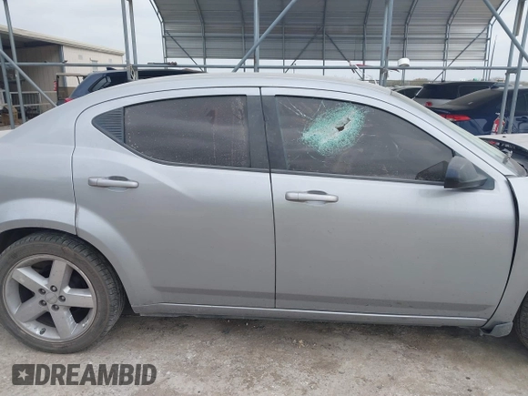 2014 Dodge Avenger SE with VIN 1C3CDZAB8EN180915, listed as a IAAI auction lot 41680141 with 147,575 mi miles. Bid and sale history available at carsss.com. Image 14.