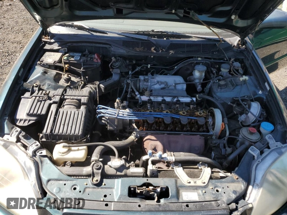 1997 Honda Civic EX z VIN 1HGEJ8142VL136575, wystawiony jako Copart lot #49732395 z przebiegiem 296 782 mil mil oraz Szkoda całkowita • Salvage title. Historia ofert i sprzedaży dostępna na DreamBid. Obrazek 11.