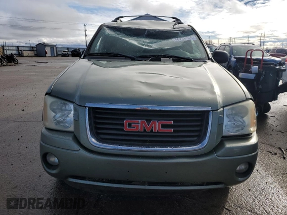 2004 GMC Envoy XL SLE with VIN 1GKET16S346170517, listed as a Copart auction lot 86748724 with 205,720 mi miles and Salvage Title. Bid and sale history available at carsss.com. Image 5.