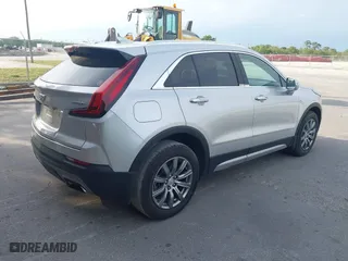 2020 Cadillac XT4 FWD Premium Luxury with VIN 1GYFZCR44LF060642, listed as a IAAI auction lot 41624689 with 37,901 mi miles. Bid and sale history available at carsss.com. Image 4.