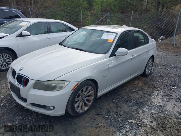 2011 BMW 3 Series 328i with VIN WBAPH7G50BNM55631, listed as a IAAI auction lot 41708771 with 196,086 mi miles. Bid and sale history available at carsss.com. Image 2.