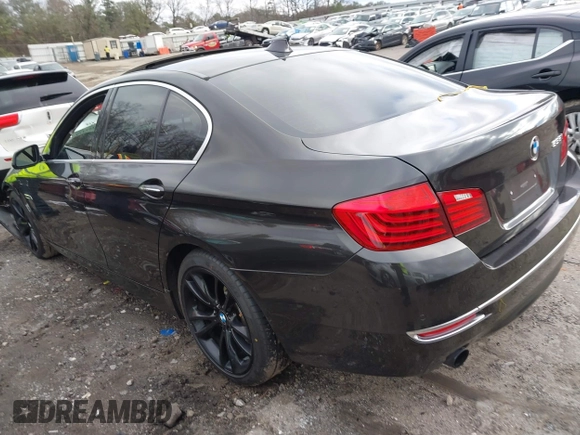 2014 BMW 5 Series 535i with VIN WBA5B1C51ED480639, listed as a IAAI auction lot 41257379 with Not Provided miles. Bid and sale history available at carsss.com. Image 3.