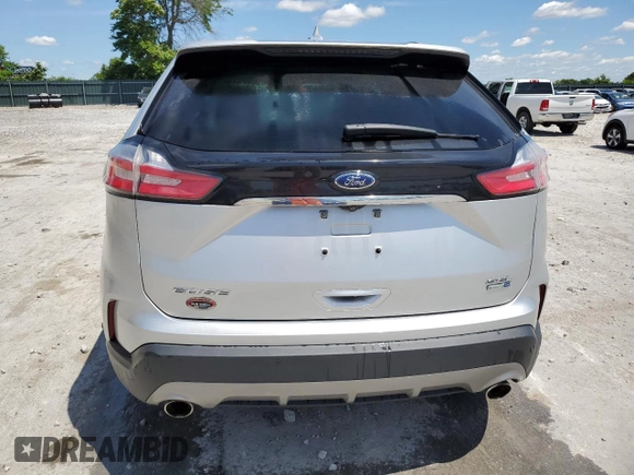 2019 Ford Edge SEL with VIN 2FMPK4J90KBB40298, listed as a Copart auction lot 56953585 with 110,639 mi miles and Salvage title. Bid and sale history available at DreamBid. Image 6.