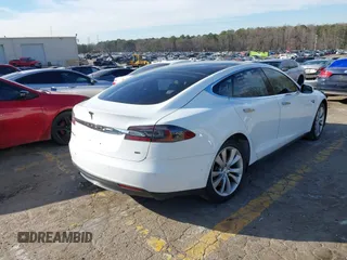 2014 Tesla Model S 60 with VIN 5YJSA1H13EFP62451, listed as a IAAI auction lot 41639068 with 88,000 mi miles and . Bid and sale history available at DreamBid. Image 4.