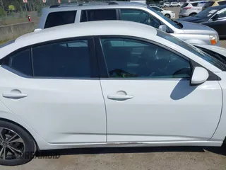 2021 Nissan Sentra SV with VIN 3N1AB8CV1MY285892, listed as a IAAI auction lot 42203454 with 56,147 mi miles and . Bid and sale history available at DreamBid. Image 13.