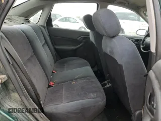 2000 Ford Focus SE z VIN 1FAFP3438YW379761, wystawiony jako Copart lot #58156125 z przebiegiem 103 816 mil mil oraz Szkoda całkowita • Salvage title. Historia ofert i sprzedaży dostępna na DreamBid. Obrazek 10.