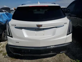 2023 Cadillac XT5 AWD Sport with VIN 1GYKNGRS4PZ191199, listed as a Copart auction lot 74790394 with 17,281 mi miles and Non repairable. Bid and sale history available at DreamBid. Image 6.