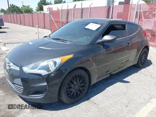 2013 Hyundai Veloster w/Black Int with VIN KMHTC6AD4DU151409, listed as a IAAI auction lot 42639582 with 283,208 mi miles and . Bid and sale history available at DreamBid. Image 2.