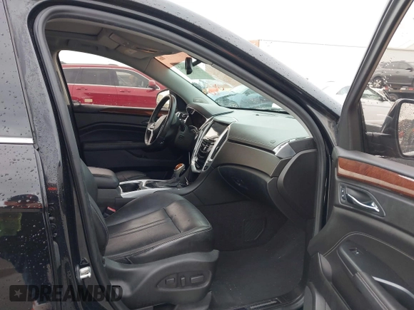 2013 Cadillac SRX Luxury Collection z VIN 3GYFNCE33DS506348, wystawiony jako IAAI lot #42202002 z przebiegiem 117 216 mil mil oraz . Historia ofert i sprzedaży dostępna na DreamBid. Obrazek 5.