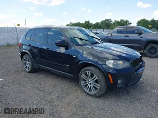2011 BMW X5 35i with VIN 5UXZV4C53BL743050, listed as a IAAI auction lot 40074369 with 118,970 mi miles. Bid and sale history available at carsss.com. Image 1.