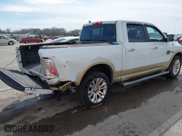 2014 Ram 1500 Longhorn Limited with VIN 1C6RR7PT9ES127063, listed as a IAAI auction lot 41817112 with 126,203 mi miles and . Bid and sale history available at DreamBid. Image 4.