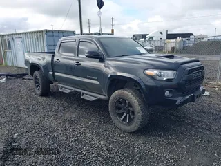 2020 Toyota Tacoma SR5 with VIN 3TMDZ5BN1LM095926, listed as a IAAI auction lot 41862320 with 67,987 mi miles and . Bid and sale history available at DreamBid. Image 1.