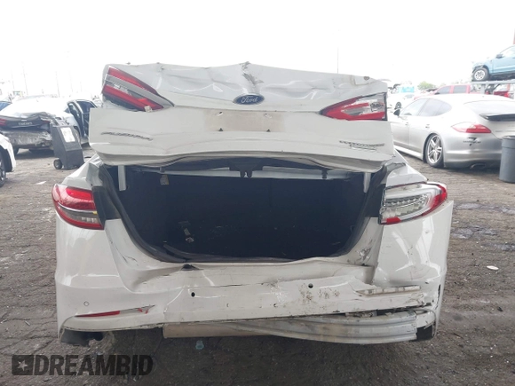 2019 Ford Fusion Titanium with VIN 3FA6P0K90KR236674, listed as a IAAI auction lot 42008633 with 99,737 mi miles and . Bid and sale history available at DreamBid. Image 6.