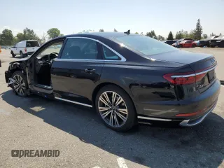 2022 Audi A8 with VIN WAULDAF86NN001617, listed as a Copart auction lot 63068504 with 25,974 mi miles and Salvage Title. Bid and sale history available at carsss.com. Image 2.