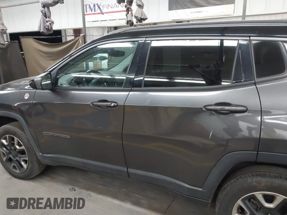 2018 Jeep Compass Trailhawk with VIN 3C4NJDDB5JT451600, listed as a IAAI auction lot 41893541 with 155,528 mi miles and . Bid and sale history available at DreamBid. Image 14.