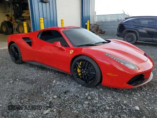 2017 Ferrari 488 z VIN ZFF80AMA6H0228173, wystawiony jako Copart lot #77401204 z przebiegiem 16 556 mil mil oraz Tytuł czysty. Historia ofert i sprzedaży dostępna na DreamBid. Obrazek 4.