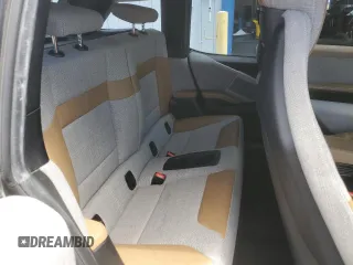 2016 BMW i3 z VIN WBY1Z4C50GV506450, wystawiony jako Copart lot #54449865 z przebiegiem 102 575 mil mil oraz Szkody całkowita. Historia ofert i sprzedaży dostępna na DreamBid. Obrazek 10.