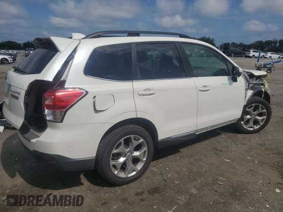 2018 Subaru Forester Touring с VIN JF2SJAWC1JH486805, выставлен на аукционе Copart как лот 63828505 с пробегом 51 427 миль миль и Списание • Salvage title. История ставок и продаж доступна на DreamBid. Изображение 3.