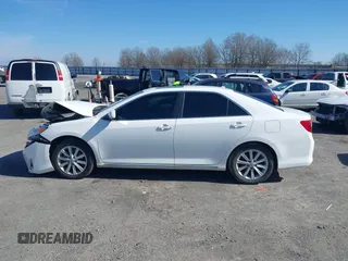 2012 Toyota Camry SE with VIN 4T1BK1FK1CU509931, listed as a IAAI auction lot 41474984 with 86,707 mi miles. Bid and sale history available at carsss.com. Image 13.