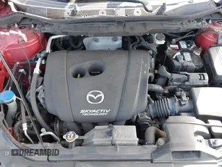 2016 Mazda CX-5 Sport with VIN JM3KE2BY4G0701442, listed as a IAAI auction lot 41682335 with 125,624 mi miles. Bid and sale history available at carsss.com. Image 10.