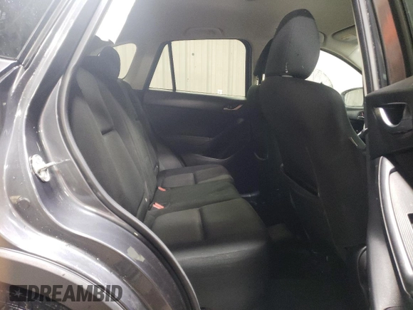 2014 Mazda CX-5 Sport z VIN JM3KE4BE2E0371864, wystawiony jako Copart lot #47225335 z przebiegiem 157 483 mil mil oraz Szkoda całkowita • Salvage title. Historia ofert i sprzedaży dostępna na DreamBid. Obrazek 10.