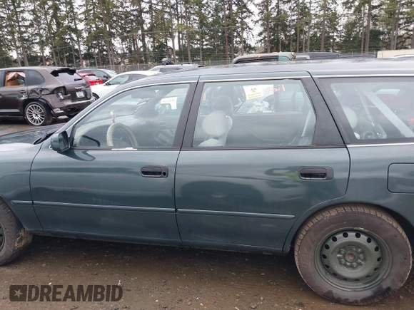 1996 Toyota Camry LE z VIN 4T1EF12K9TU116427, wystawiony jako IAAI lot #38696498 z przebiegiem 242 599 mil mil oraz . Historia ofert i sprzedaży dostępna na DreamBid. Obrazek 13.