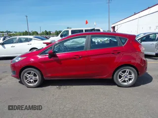 2017 Ford Fiesta SE z VIN 3FADP4EJ4HM168566, wystawiony jako IAAI lot #42223504 z przebiegiem 53 572 mil mil oraz . Historia ofert i sprzedaży dostępna na DreamBid. Obrazek 14.