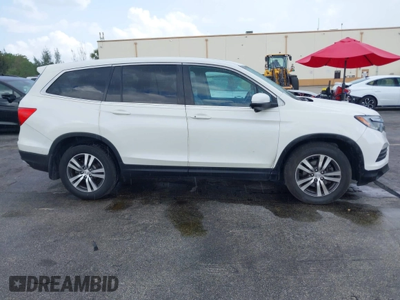 2016 Honda Pilot EX-L with VIN 5FNYF5H50GB043294, listed as a IAAI auction lot 41930654 with 92,728 mi miles and . Bid and sale history available at DreamBid. Image 13.