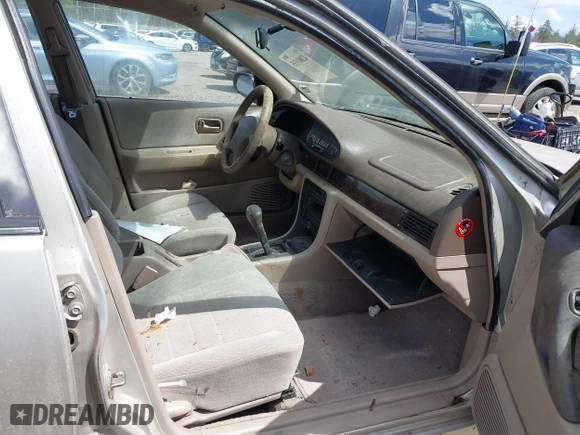 1997 Nissan Altima XE with VIN 1N4BU31D8VT205299, listed as a IAAI auction lot 42081935 with 235,426 mi miles. Bid and sale history available at carsss.com. Image 5.