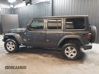 2018 Jeep Wrangler Unlimited Sport S with VIN 1C4HJXDG5JW126496, listed as a IAAI auction lot 42390584 with 163,476 mi miles and . Bid and sale history available at DreamBid. Image 15.