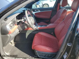 2023 Genesis G70 3.3T with VIN KMTG54TE4PU122153, listed as a Copart auction lot 50794015 with 13,604 mi miles and Salvage Title. Bid and sale history available at carsss.com. Image 7.