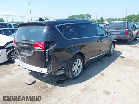 2018 Chrysler Pacifica Touring L Plus with VIN 2C4RC1EG2JR314847, listed as a IAAI auction lot 42716082 with 92,544 mi miles and . Bid and sale history available at DreamBid. Image 4.