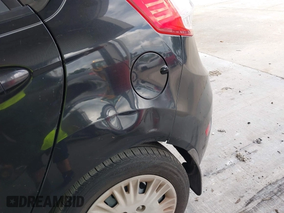 2014 Ford Fiesta S with VIN 3FADP4TJ7EM101992, listed as a IAAI auction lot 42487696 with 205,585 mi miles and . Bid and sale history available at DreamBid. Image 6.
