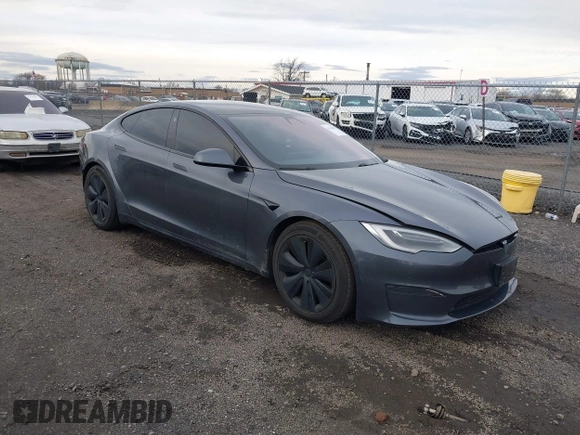 2021 Tesla Model S Long Range with VIN 5YJSA1E51MF440929, listed as a IAAI auction lot 41144902 with Not provided miles and . Bid and sale history available at DreamBid. Image 1.