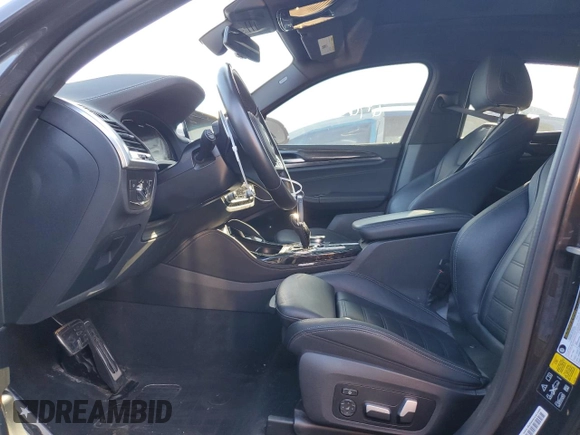 2021 BMW X4 M40i with VIN 5UX2V5C08M9E17162, listed as a Copart auction lot 67602073 with 33,879 mi miles. Bid and sale history available at carsss.com. Image 7.
