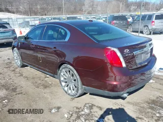 2012 Lincoln MKS with VIN 1LNHL9ER7CG803675, listed as a IAAI auction lot 41622367 with 128,157 mi miles. Bid and sale history available at carsss.com. Image 3.