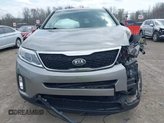 2015 Kia Sorento LX with VIN 5XYKTCA66FG570155, listed as a IAAI auction lot 42123965 with 110,748 mi miles and . Bid and sale history available at carsss.com. Image 12.