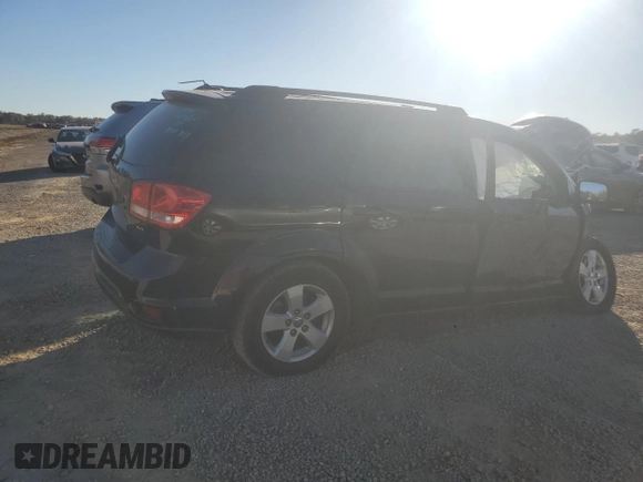 2012 Dodge Journey SXT with VIN 3C4PDCBG3CT395989, listed as a Copart auction lot 85507784 with Not provided miles and Salvage title. Bid and sale history available at DreamBid. Image 3.