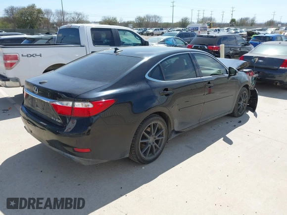 2013 Lexus ES 4dr Sdn with VIN JTHBK1GG4D2067124, listed as a IAAI auction lot 41668886 with 154,478 mi miles. Bid and sale history available at carsss.com. Image 4.