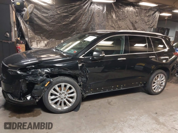 2020 Cadillac XT6 AWD Premium Luxury with VIN 1GYKPDRSXLZ111021, listed as a IAAI auction lot 37922511 with 54,755 mi miles and . Bid and sale history available at DreamBid. Image 14.