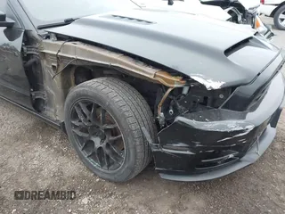 2013 Ford Mustang GT with VIN 1ZVBP8CF3D5240409, listed as a IAAI auction lot 41022550 with 133,744 mi miles. Bid and sale history available at carsss.com. Image 6.