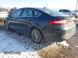 2014 Ford Fusion Titanium with VIN 3FA6P0K90ER336116, listed as a IAAI auction lot 41559792 with 132,852 mi miles. Bid and sale history available at carsss.com. Image 3.