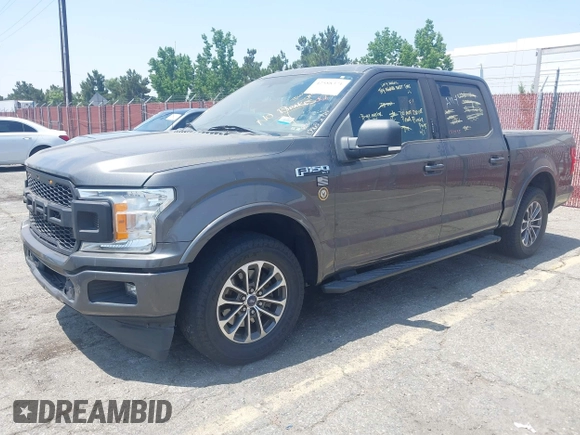 2018 Ford F-150 XL with VIN 1FTEW1CPXJKD56562, listed as a IAAI auction lot 42588371 with 137,496 mi miles and . Bid and sale history available at DreamBid. Image 2.