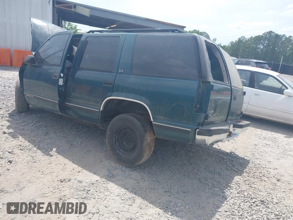 1996 GMC Yukon with VIN 1GKEC13R7TJ704518, listed as a IAAI auction lot 42095936 with 1 mi miles. Bid and sale history available at carsss.com. Image 3.