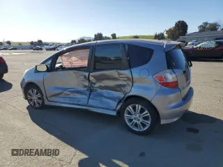 2009 Honda Fit Sport with VIN JHMGE88459S012456, listed as a Copart auction lot 51525845 with 59,142 mi miles and Salvage Title. Bid and sale history available at carsss.com. Image 2.