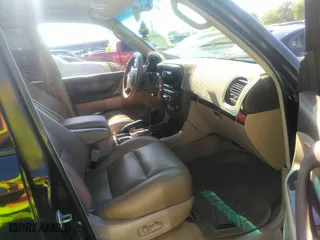 2001 Toyota Land Cruiser with VIN JTEHT05J512016563, listed as a IAAI auction lot 41868193 with 247,653 mi miles. Bid and sale history available at carsss.com. Image 5.